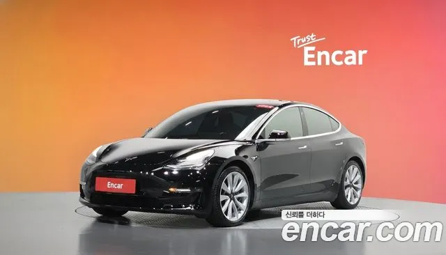 Tesla Model 3 — фото 20