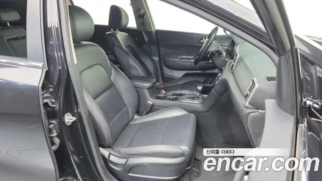 Kia Sportage — фото 11