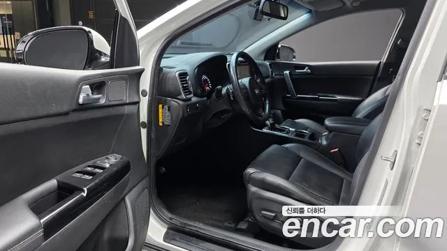 Kia Sportage — фото 10