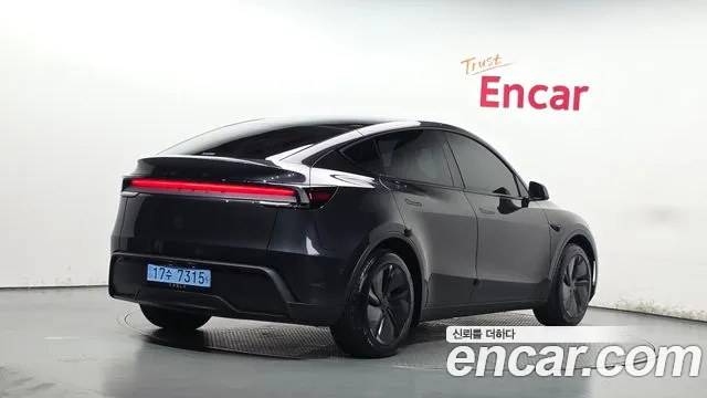 Tesla Model Y — фото 2