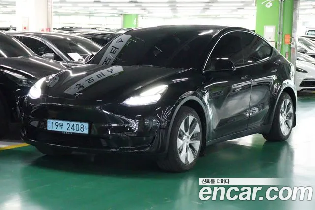 Tesla Model Y — фото 2