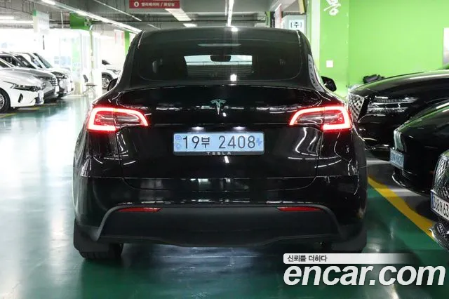 Tesla Model Y — фото 4