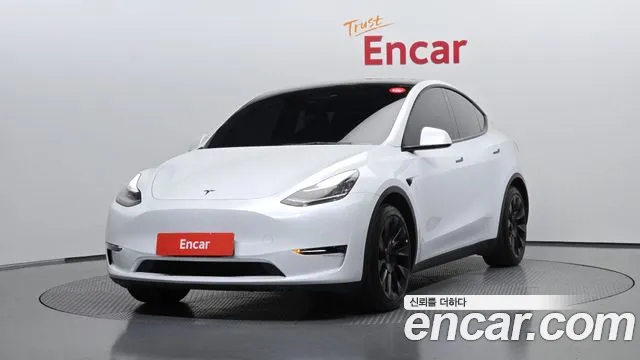 Tesla Model Y — фото 1