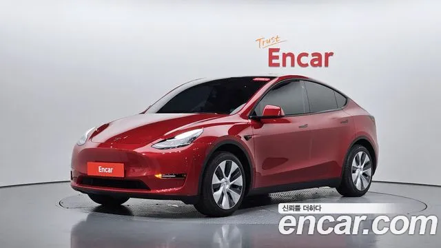 Tesla Model Y — фото 1