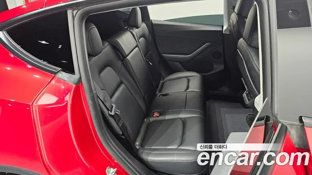 Tesla Model Y — фото 11
