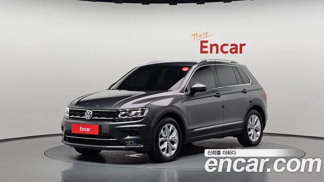 Volkswagen Tiguan — фото 1