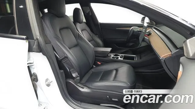 Tesla Model 3 — фото 11