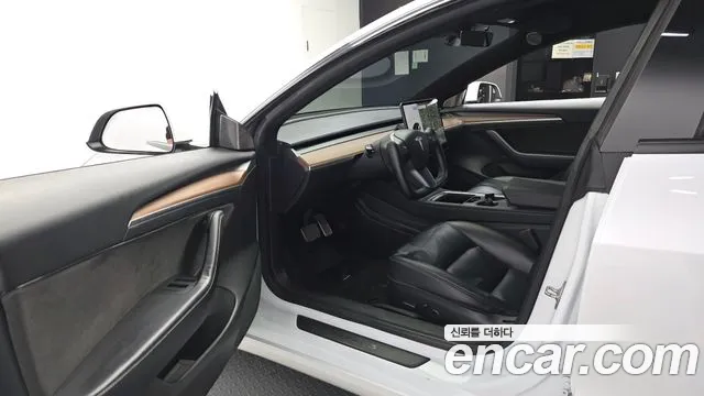 Tesla Model 3 — фото 10