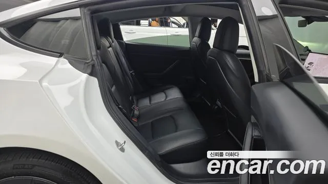 Tesla Model 3 — фото 11