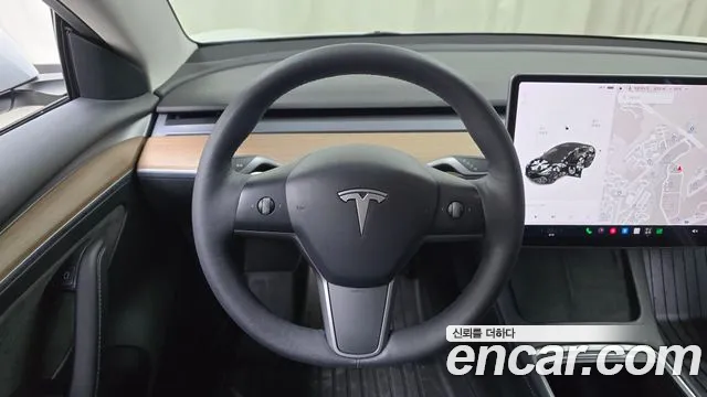 Tesla Model 3 — фото 11
