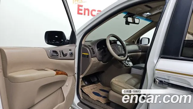 Kia Carnival — фото 10