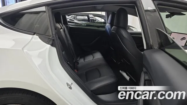 Tesla Model 3 — фото 11