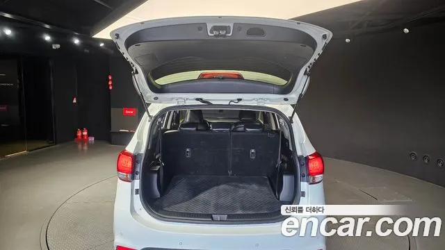 Kia Carens — фото 19
