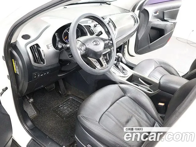 Kia Sportage — фото 17