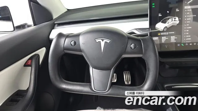 Tesla Model Y — фото 12