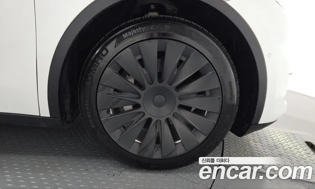 Tesla Model Y — фото 21