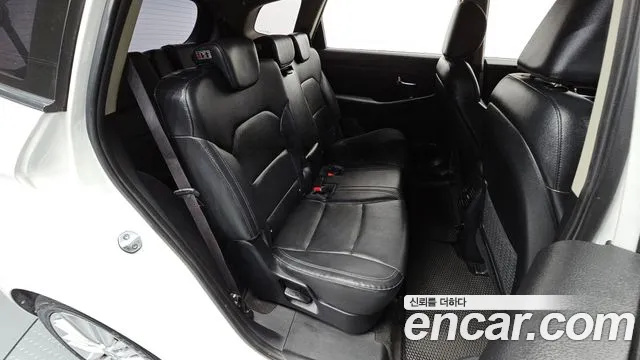 Kia Carens — фото 11