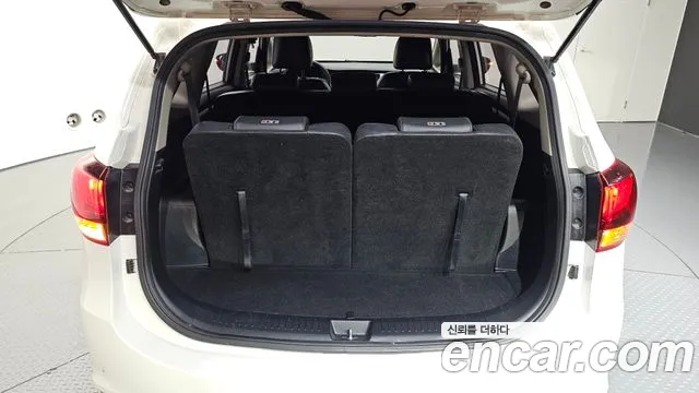 Kia Carens — фото 30