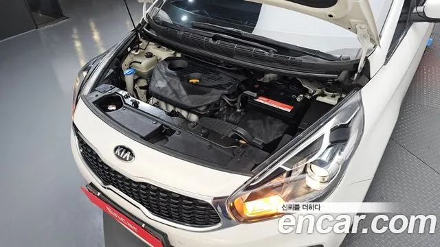 Kia Carens — фото 6