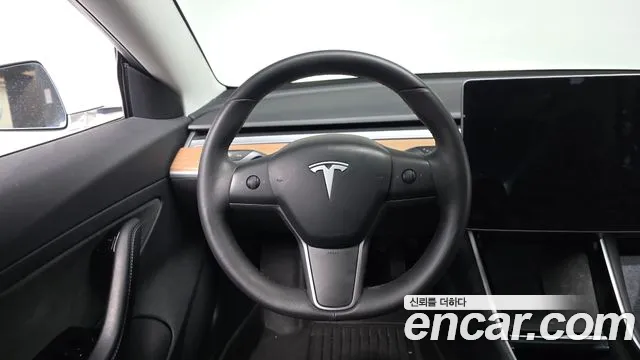 Tesla Model 3 — фото 11
