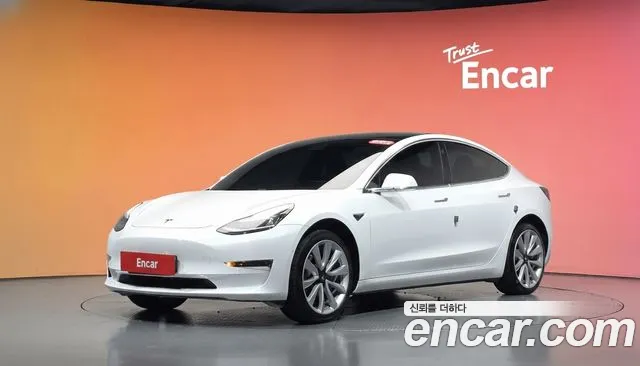 Tesla Model 3 — фото 20