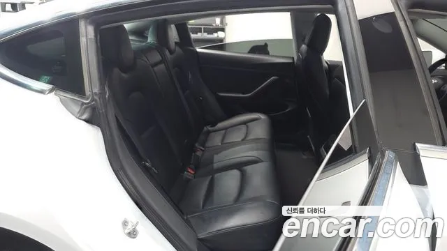 Tesla Model 3 — фото 10