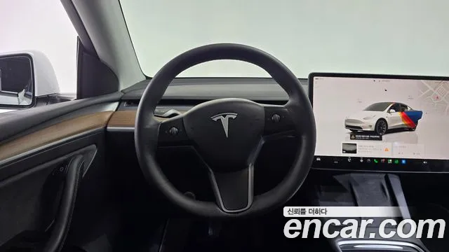 Tesla Model Y — фото 13