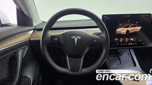 Tesla Model 3 — фото 12