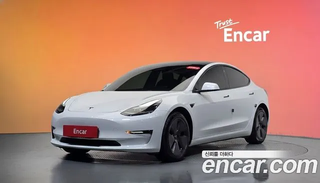 Tesla Model 3 — фото 21