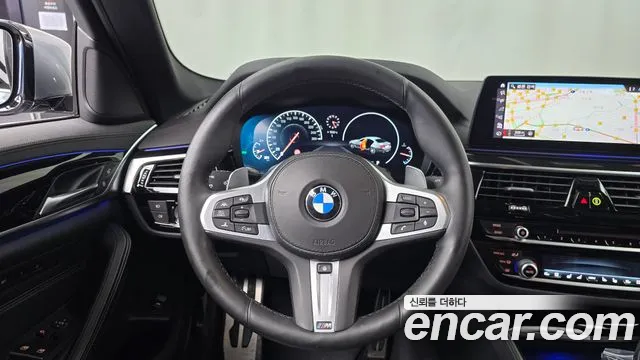 BMW 5-Series — фото 13