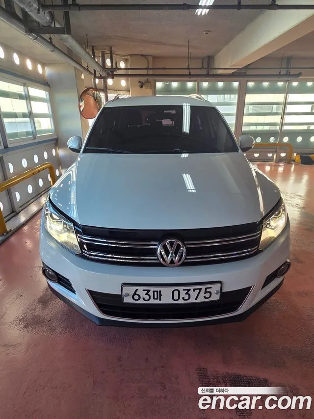 Volkswagen Tiguan — фото 1