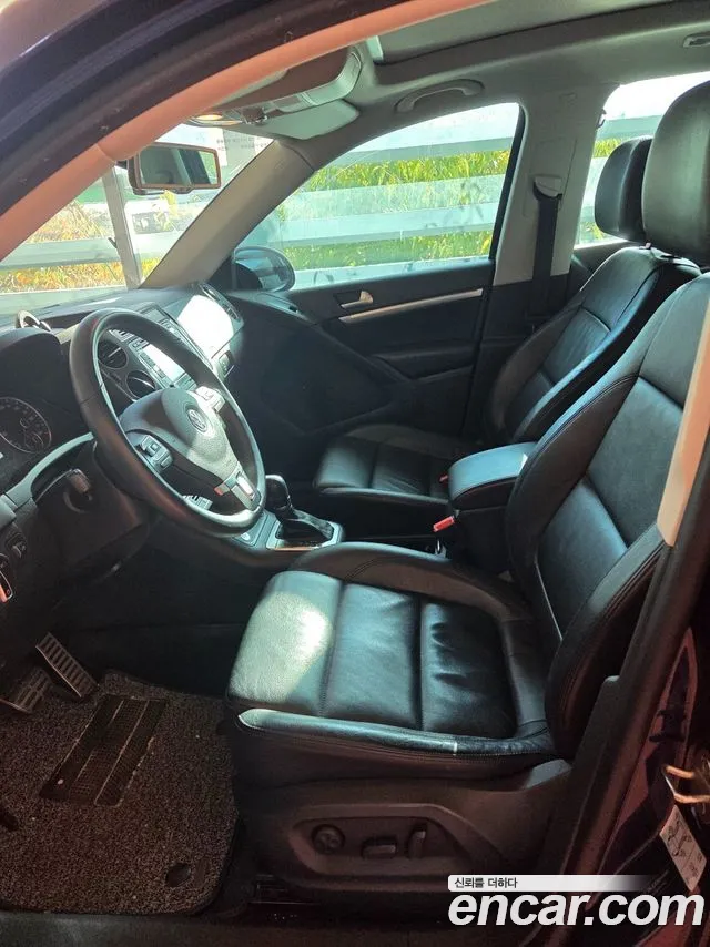 Volkswagen Tiguan — фото 7