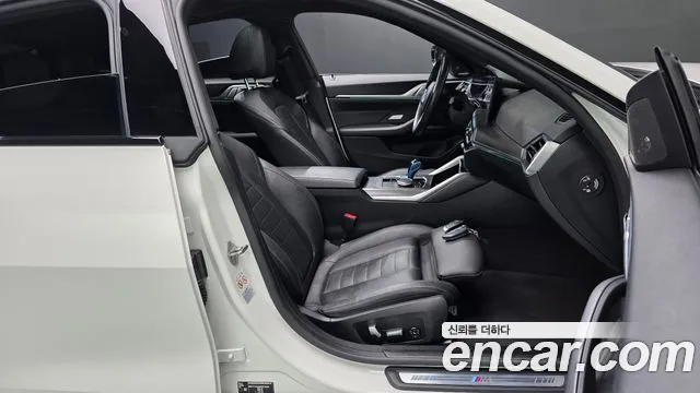 BMW i4 — фото 26