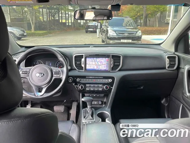 Kia Sportage — фото 11