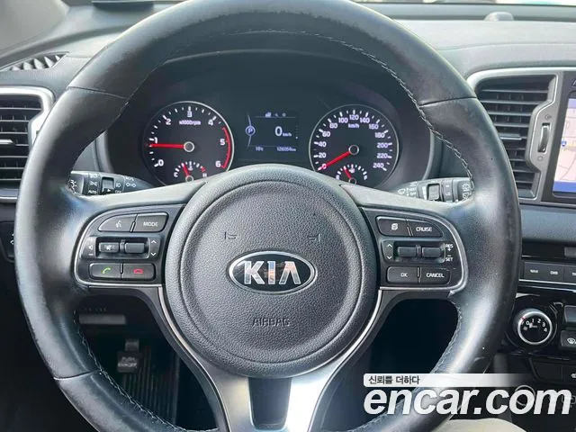Kia Sportage — фото 12