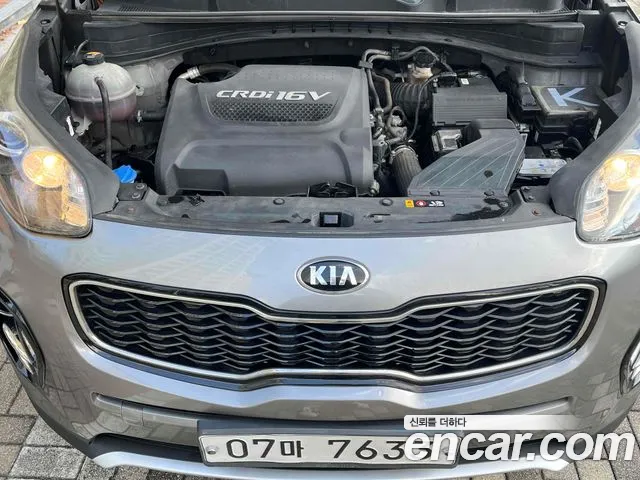 Kia Sportage — фото 7