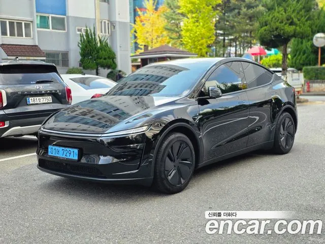 Tesla Model Y — фото 1