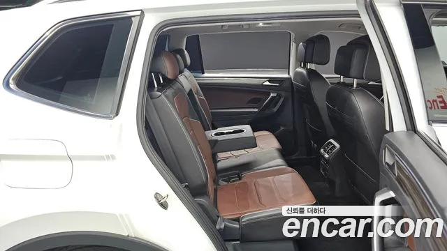Volkswagen Tiguan — фото 11
