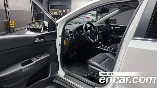 Kia Sportage — фото 10