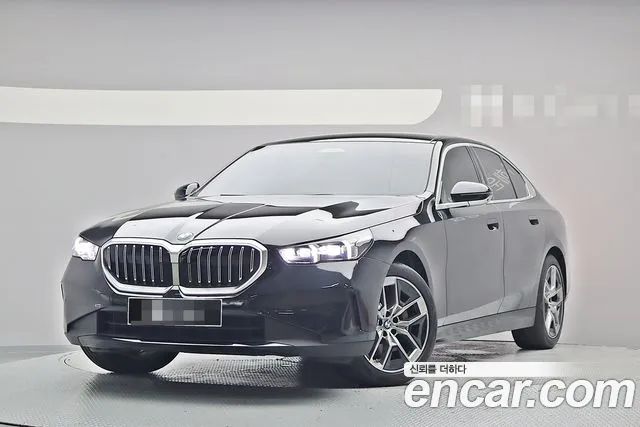 BMW 5-Series — фото 1