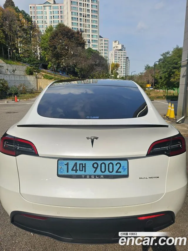 Tesla Model Y — фото 12