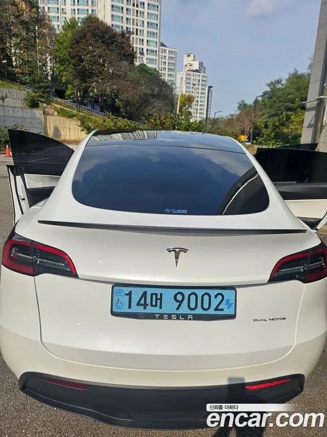 Tesla Model Y — фото 9